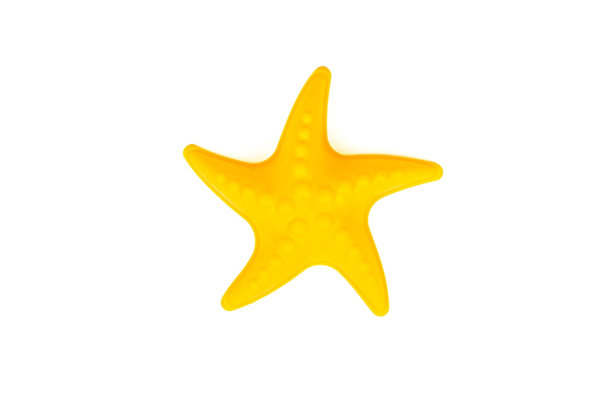 A bright yellow starfish with raised bumps sits centered on a plain white background, resembling shapes from the Toysmith 6pc Set Pink Sand Bucket Set.