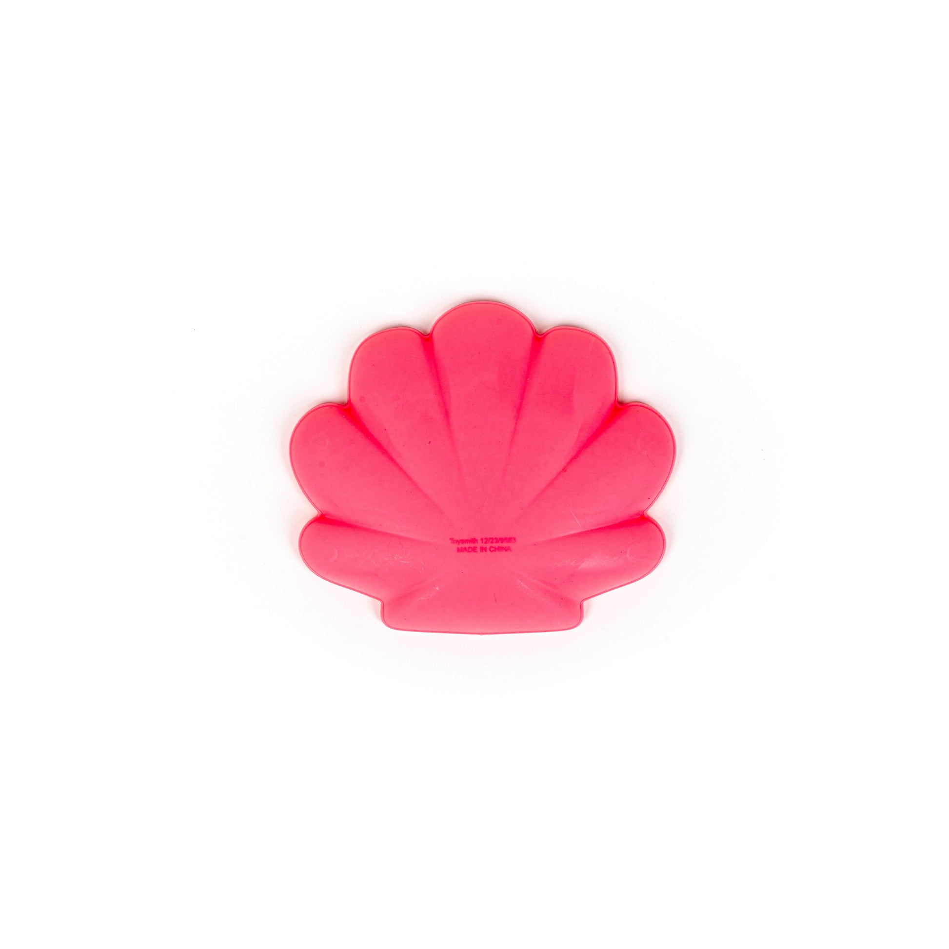 A bright pink scallop shell-shaped mold from the Toysmith 6PC Sand Mold Set by Toysmith, viewed from above on a plain white background.