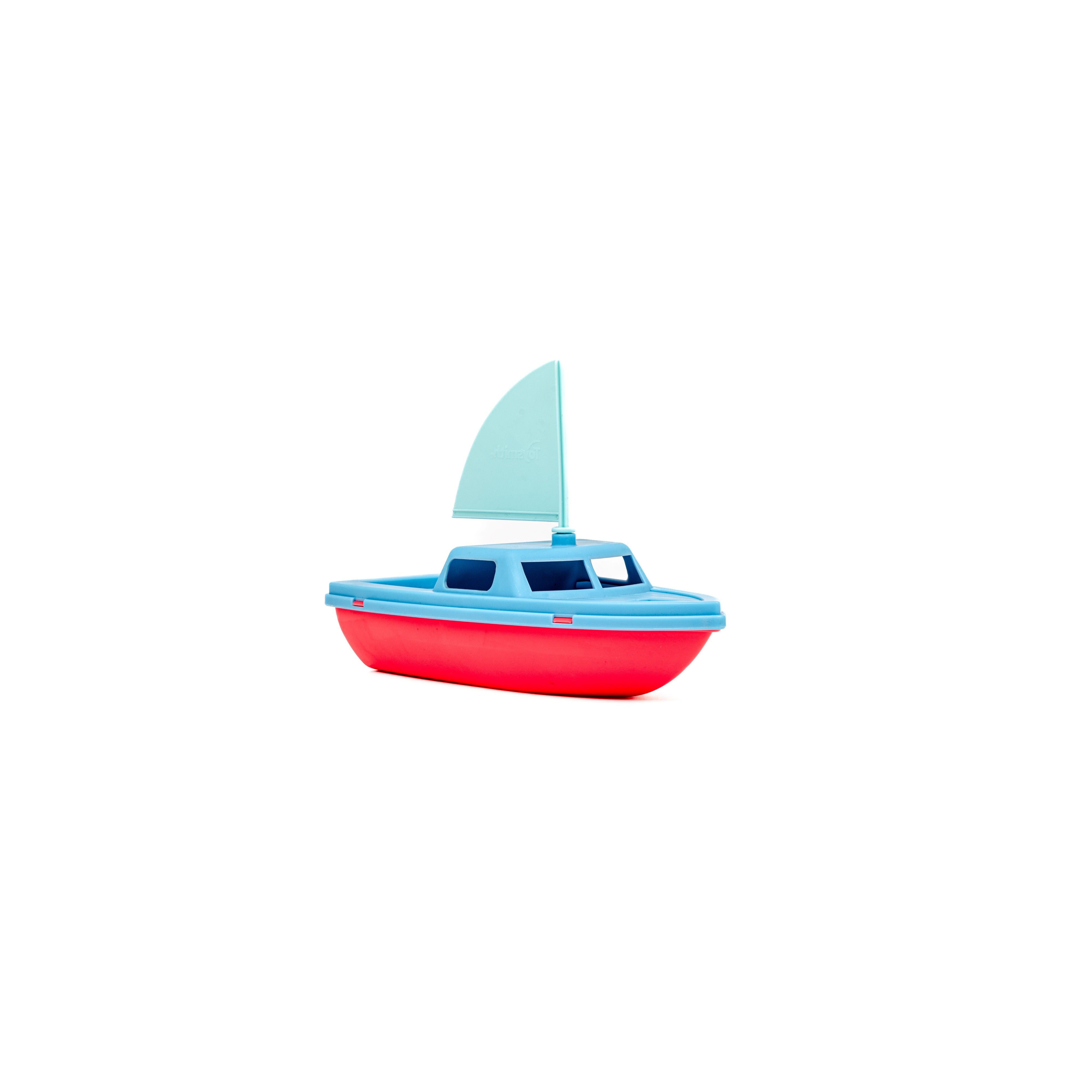 The Toysmith Mini Vehicle Boat, by Toysmith, features a blue top and sail with a red bottom, shown against a plain white background.