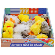 The Farm Fresh Barnyard Wind-Up Chicks display box features assorted plush wind-up toys shaped like yellow chicks, white chickens, and gray birds—perfect Easter basket toys from the Farm Fresh brand.