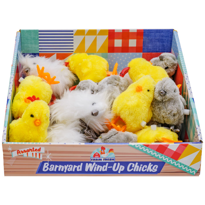 The Farm Fresh Barnyard Wind-Up Chicks display box features assorted plush wind-up toys shaped like yellow chicks, white chickens, and gray birds—perfect Easter basket toys from the Farm Fresh brand.