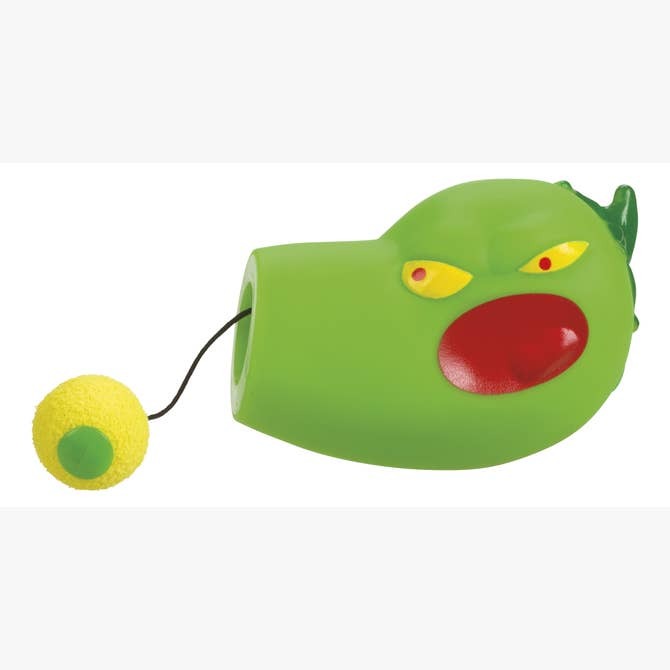 The Toysmith Jalapeno Popper is a green plastic toy shaped like a dragon’s head with yellow and red eyes and a yellow foam ball attached by a black string, designed to launch from the mouth.