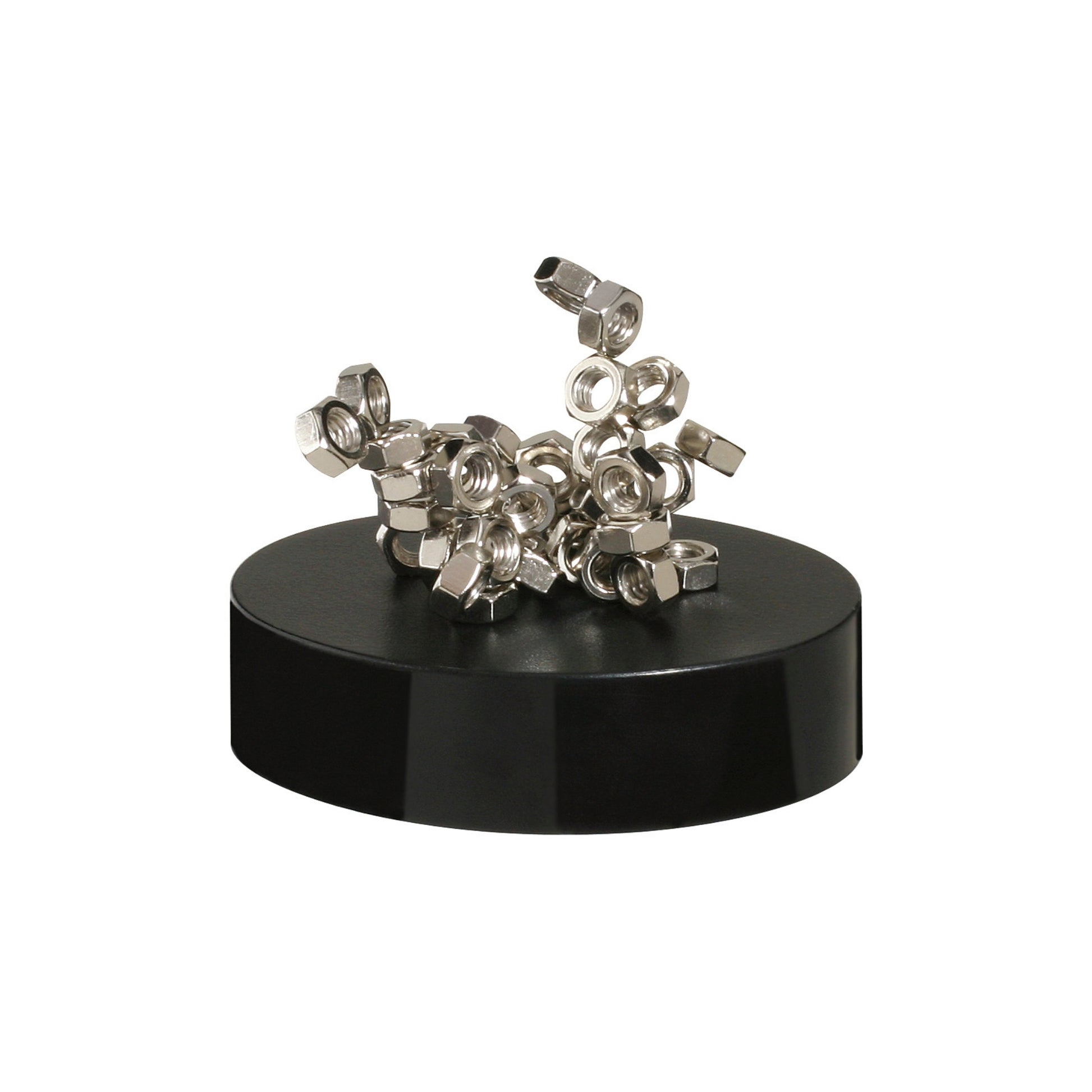 The Project Blueprint Magnetic Sculpture features silver metal nuts stacked abstractly on a round black base, creating a striking desk accessory that stands out against a white background.