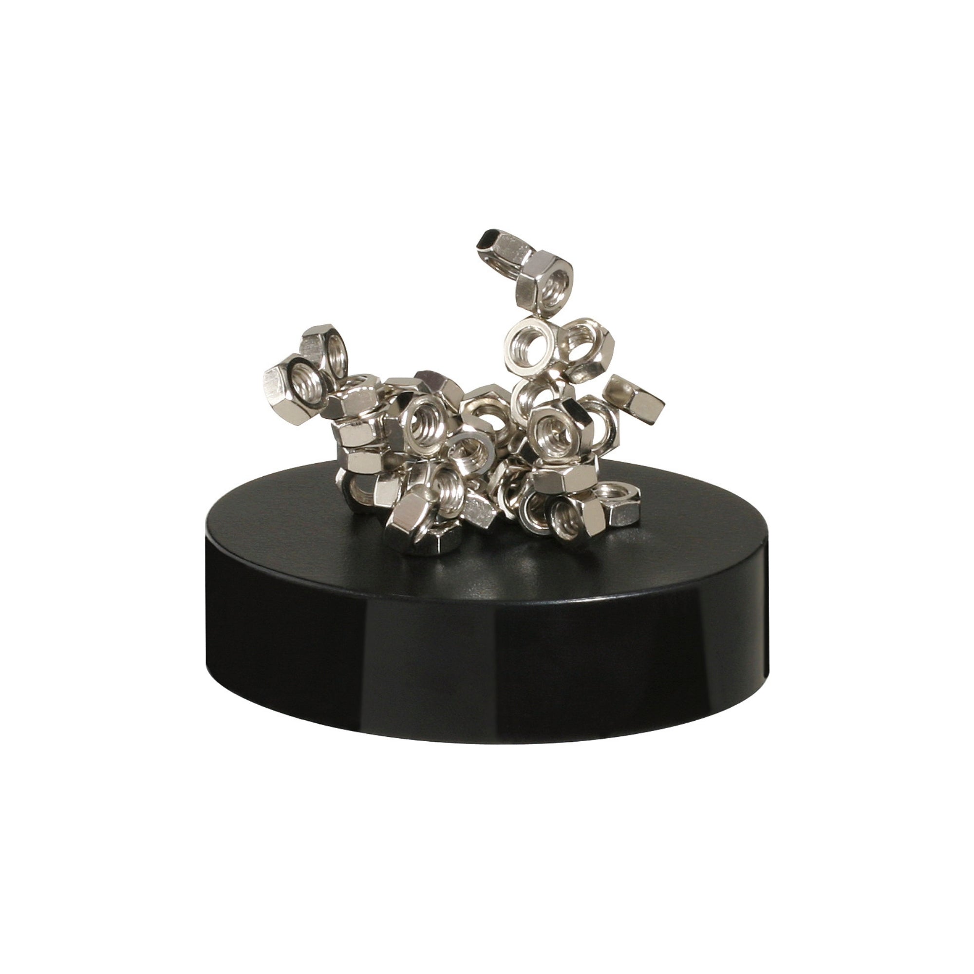 The Project Blueprint Magnetic Sculpture features silver metal nuts stacked abstractly on a round black base, creating a striking desk accessory that stands out against a white background.