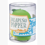 A clear plastic container labeled Toysmith Jalapeno Popper contains a green Jalapeno Popper fidget toy. The food-themed packaging features blue and white graphics and includes safety warnings.
