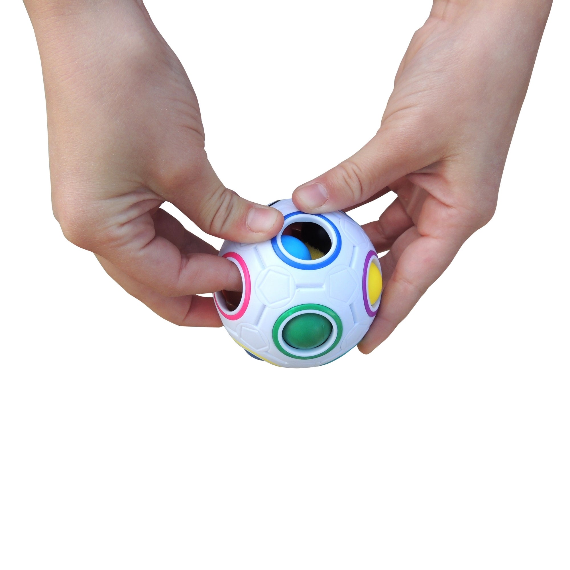 Two hands holding the Duncan Color Shift Puzzle Ball—a white ball with colorful circular holes—pressing one of the colored sections. The background is plain white.