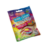 A package of Duncan SLIDA Mini Click by Duncan, featuring colorful puzzle fidget pieces on the front. The mostly purple and blue packaging displays product details and a QR code.