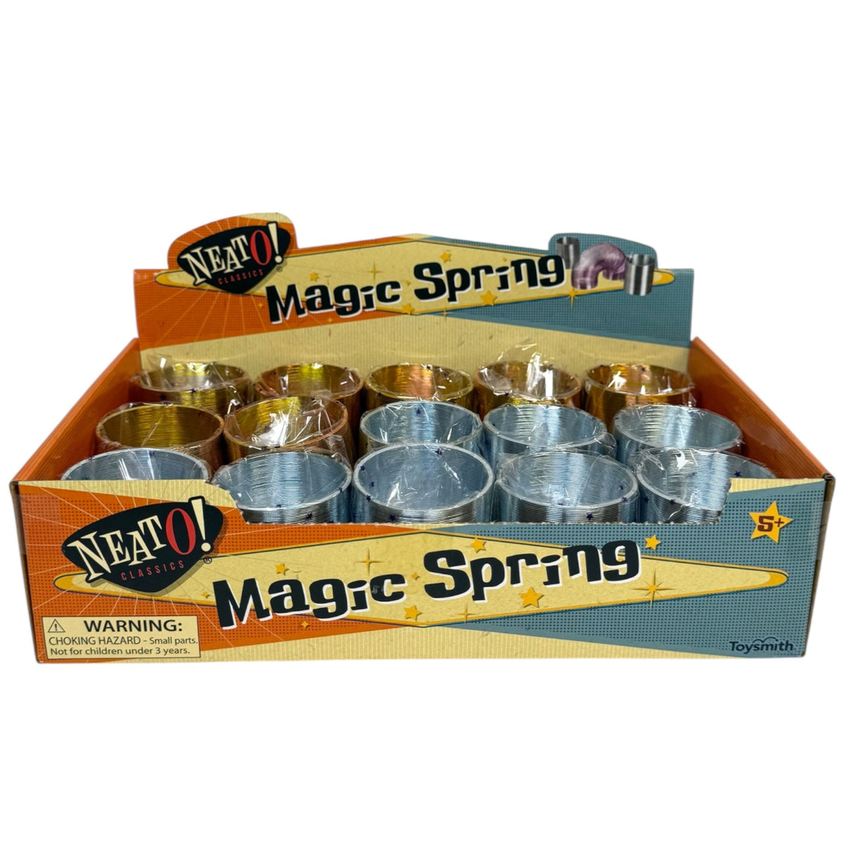 A display box of Neato! Metal Magic Springs featuring metallic coil springs in silver and gold. The retro packaging warns of small parts and is suitable for ages 5+.
