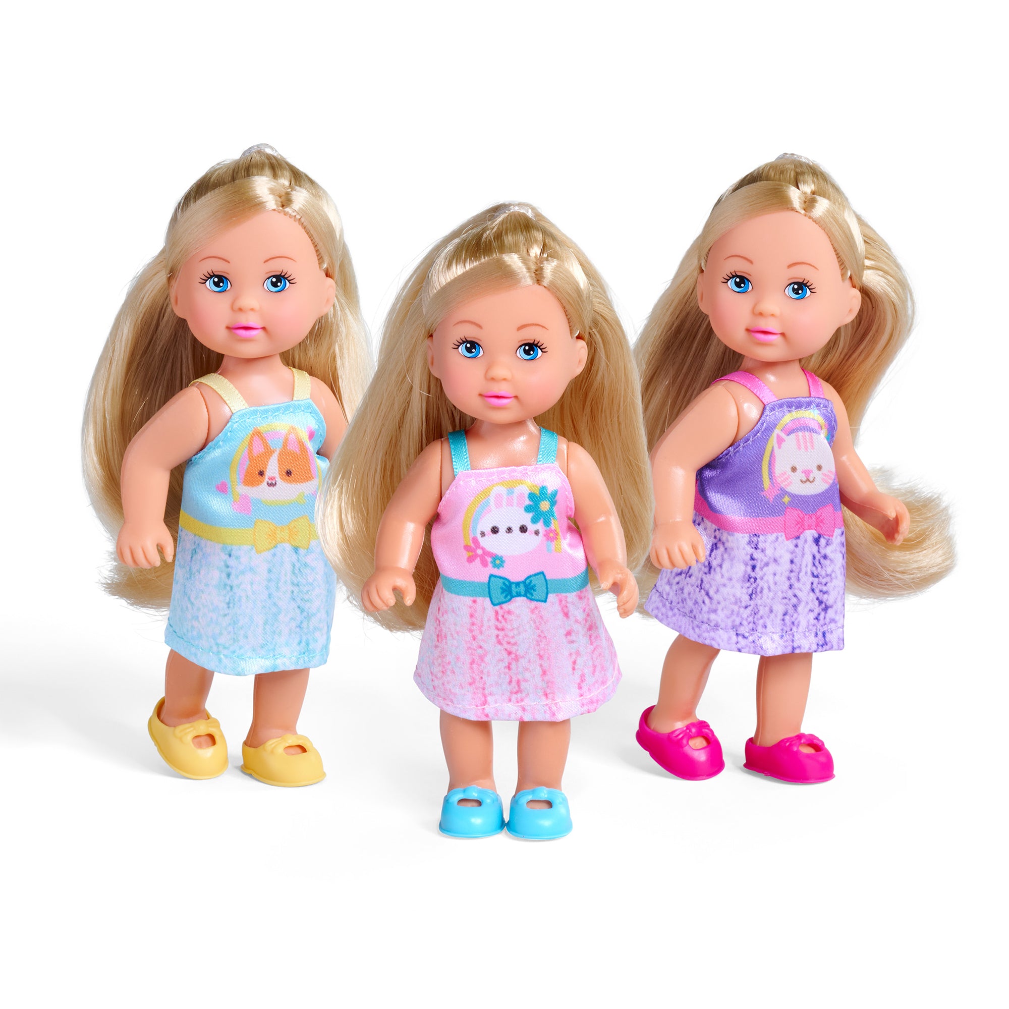 The Simba Dickie Evi Love Friends Assortment includes three blonde dolls with blue eyes, each in a colorful animal-themed dress—dog, cat, and rabbit—with matching shoes. The dolls have similar faces and stand side by side.