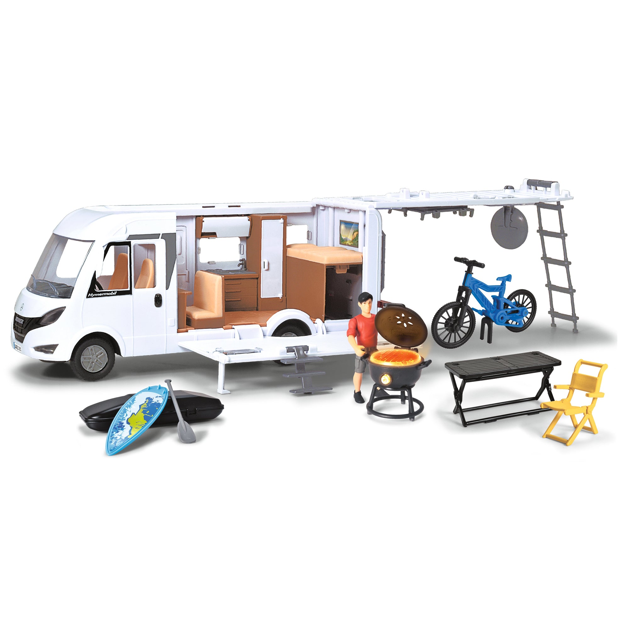 The Dickie Toys Camper Set by Simba Dickie features an open-sided toy camper van with interior kitchen and bed details, plus accessories like a bicycle, kayak, grill, table, two chairs, and a figurine outside.