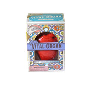 Teeny Tiny Vital Organ is a stress-relieving toy with an anatomically correct heart inside a stained glass-style, colorful box. Suitable for ages 3+, the packaging includes a choking hazard warning.