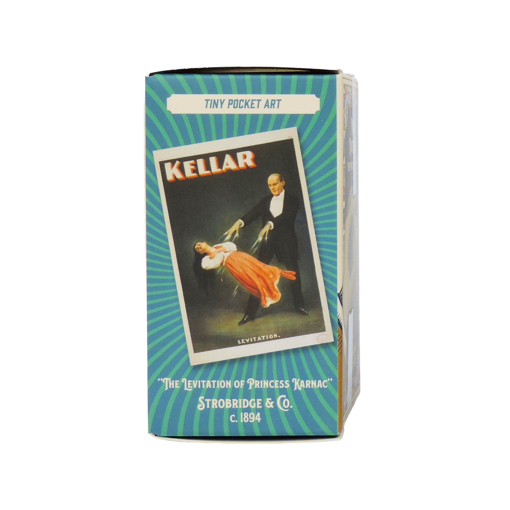 A compact box from Tiny Toys, featuring their Itty Bitty Petite Puzzle with a vintage Kellar magic show poster: “The Levitation of ‘Princess Karnac’” by Strobridge & Co. c.1894. Ideal for travel and puzzle fans seeking pocket-sized art.