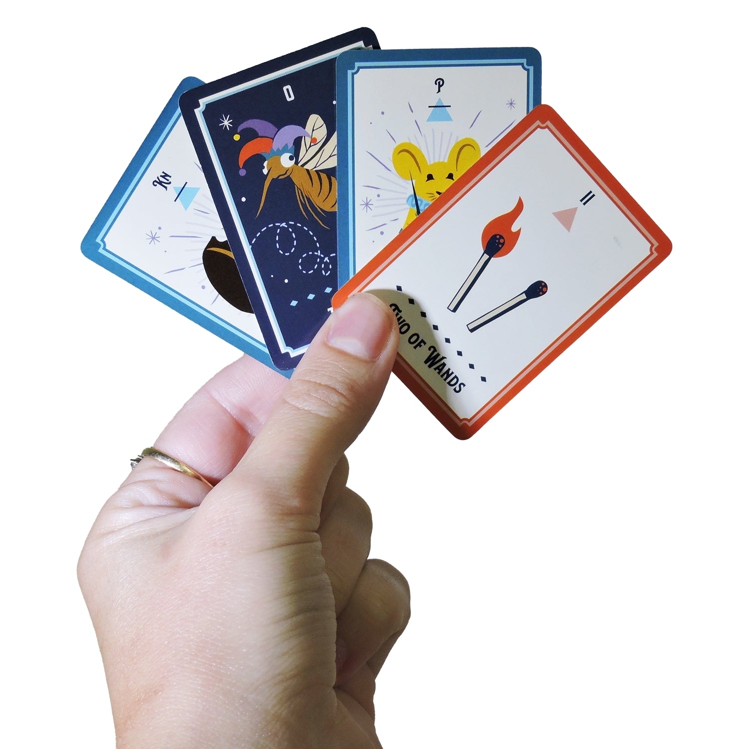 Hand holding tarot cards with colorful designs on a white background