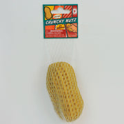 Toysmith Crunchy Nuts by Toysmith is a large peanut-shaped tactile toy in a white mesh bag with a colorful label, features a fun crunchy sound for sensory play, and includes a choking hazard warning.