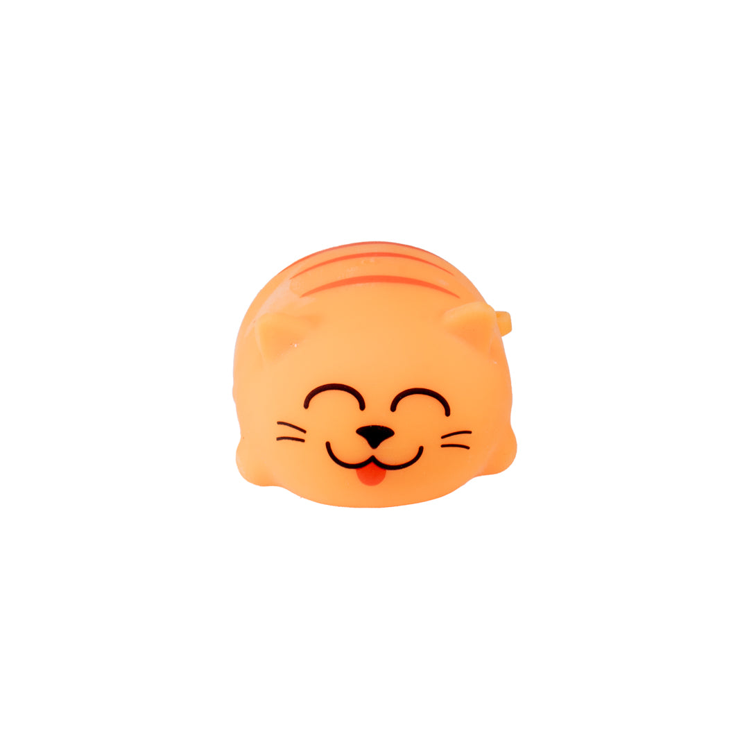 The Farm Fresh Toysmith Chubby Kitties is a small, round orange squishy kitten toy with closed eyes, a smiling face, and its tongue out—perfect for stress relief and fidgeting fun on any plain white background.