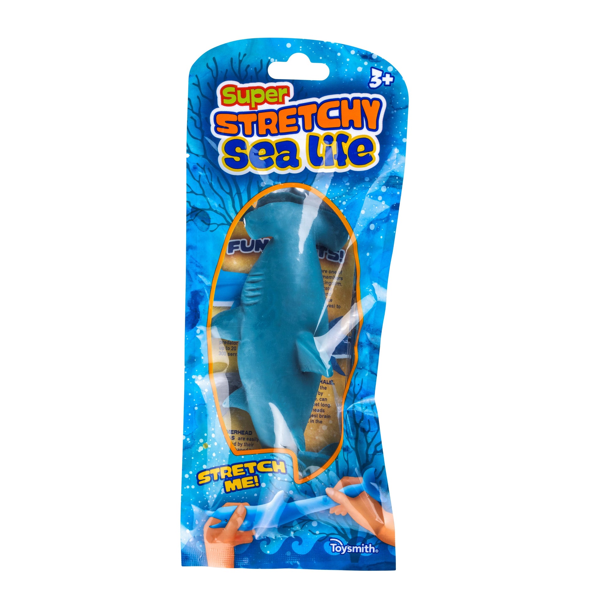 Toysmith Super Stretchy Sand Filled Sea Life is a sensory toy for ages 3+, featuring a stretchable blue shark visible in ocean-themed packaging with images of hands pulling it and colorful sea creatures in the background.