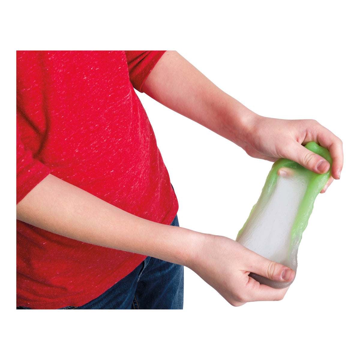 A child in a red shirt stretches Glow-Tec Mood Mudd Changing Color Dough in translucent green and white between their hands against a white background.