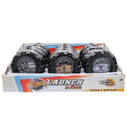 The Rollin’ Launch ’N Race by Rollin’ is a display box with 8 large toy wheels featuring black tires, colorful centers, bold graphics, and “Free Wheel Action!” Recommended for ages 3+.