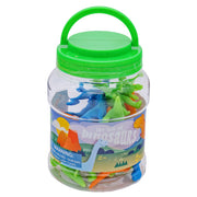 The Toysmith Jar Full of Dinos is a clear plastic jar with a green lid and handle, filled with colorful dinosaur toys. The label features playful cartoon dinos, the product name, Toysmith branding, and a small parts warning.
