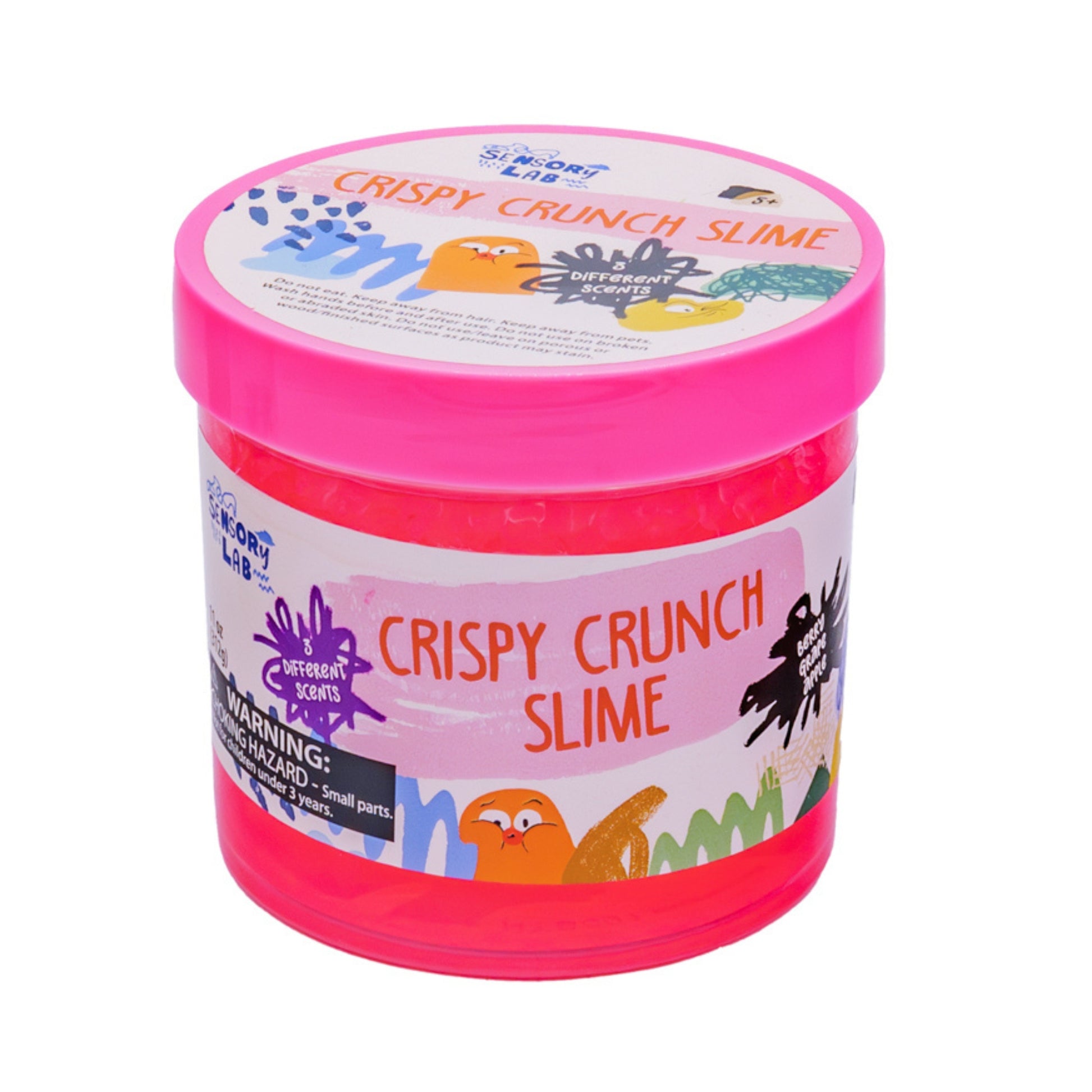 A bright pink Sensory Lab Scented Crispy Crunch Slime comes in a plastic tub with colorful cartoon graphics and a small parts warning. The lid lists various scents, making this a fun, crunchy, sensory slime experience.