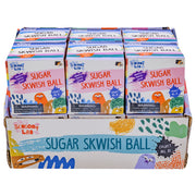 A display box holds multiple Sensory Lab Sugar Skwish Balls from Sugar Skwisheez, featuring colorful animal designs—ideal for sensory play and fidgeting fun.