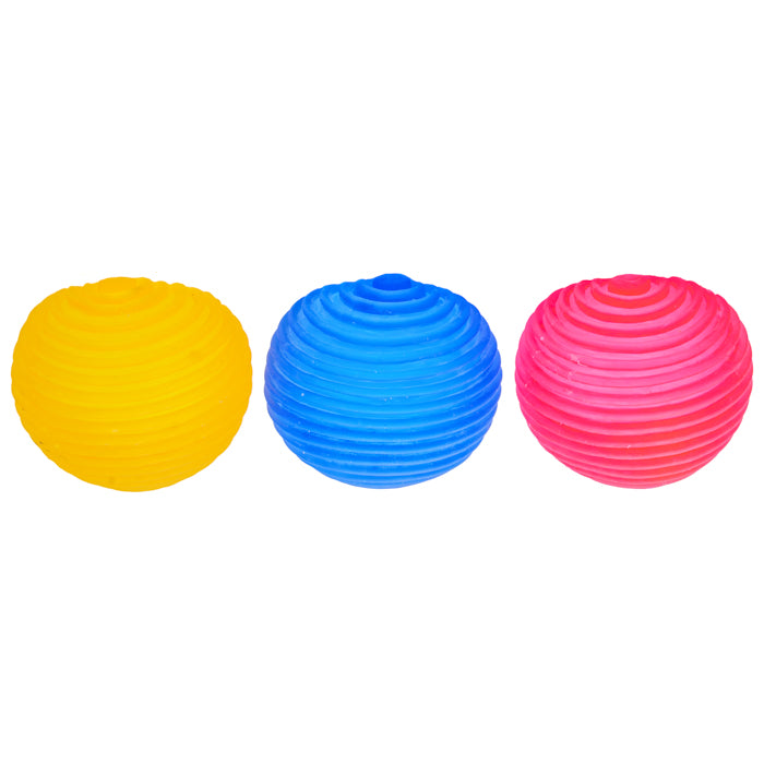 The Sensory Lab Sugar Skwish Balls by Sugar Skwisheez are yellow, blue, and pink textured rubber balls with a ridged spiral surface, ideal for sensory play or fidgeting, shown side by side on a white background.