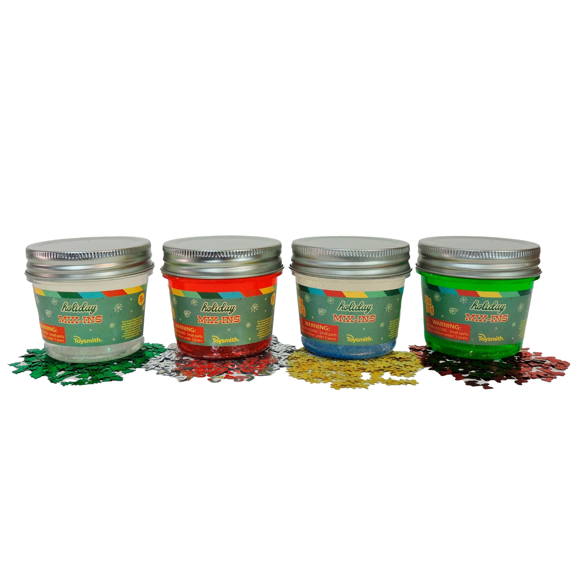 Four small metal containers with colorful labels on a white background