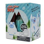 The Toysmith Melt N Grow Yeti toy box (ages 5+) features cartoon yetis, snowflakes, and trees. Just add water to grow your Yeti up to 3x its size. Includes a choking hazard warning. Brand: Toysmith.