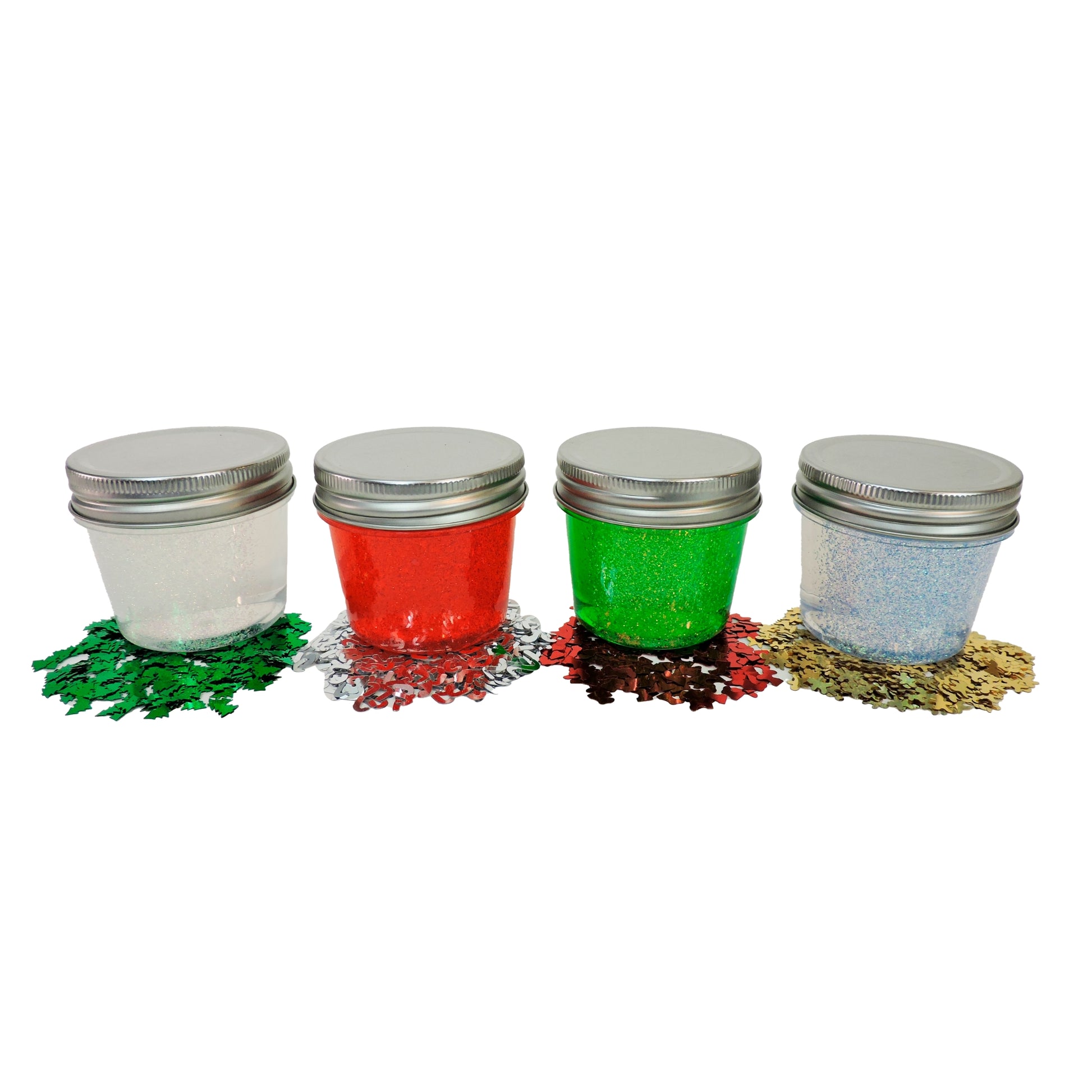 Four small jars of slime with silver lids on a white background