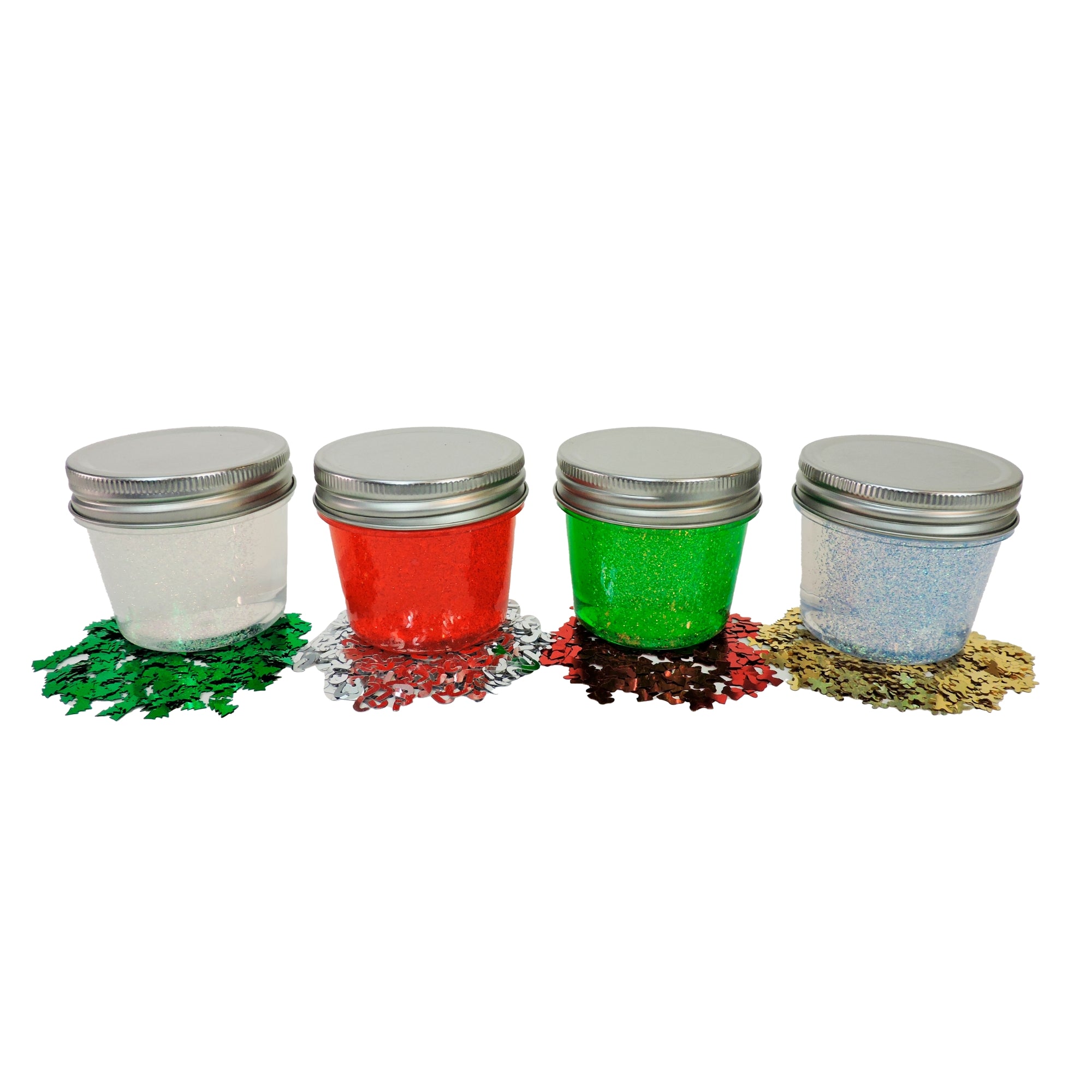 Four small jars of slime with silver lids on a white background