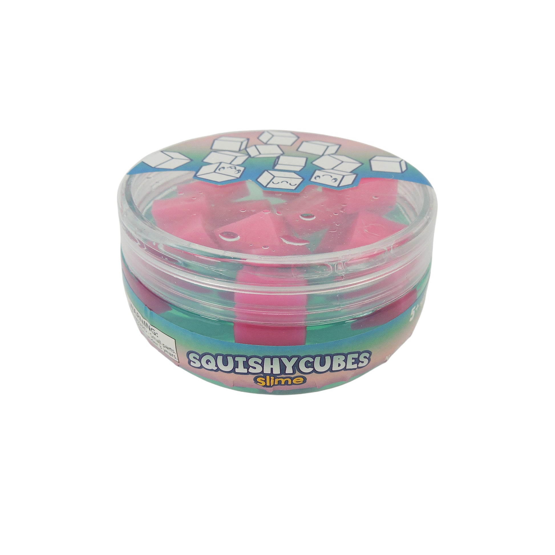 A round plastic container labeled Toysmith Squishy Cube Slime by Toysmith holds pink and teal slime cubes. The lid displays cartoon cube illustrations on a blue background.