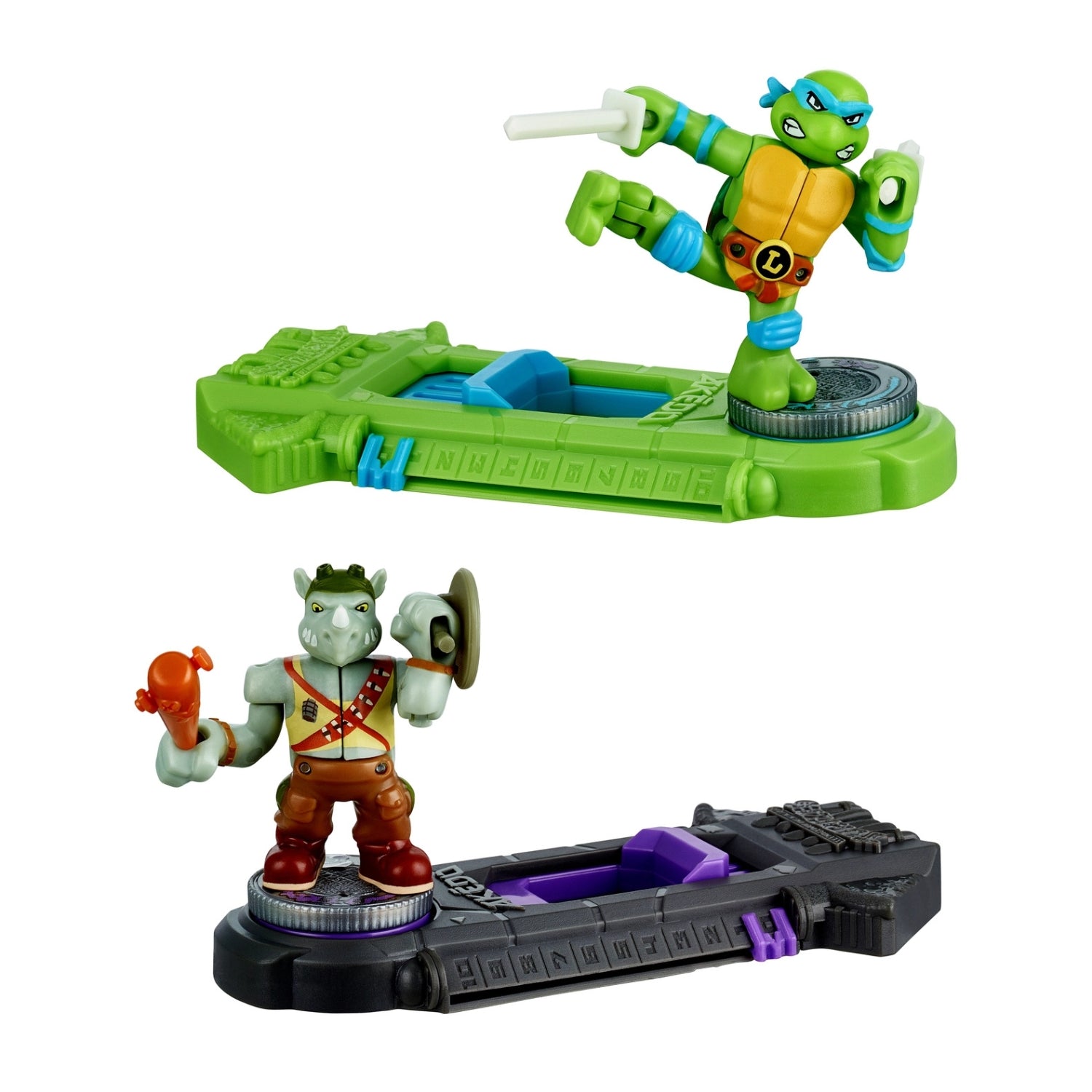 Toy figure of a turtle with a green base and another figure on a black base against a white background