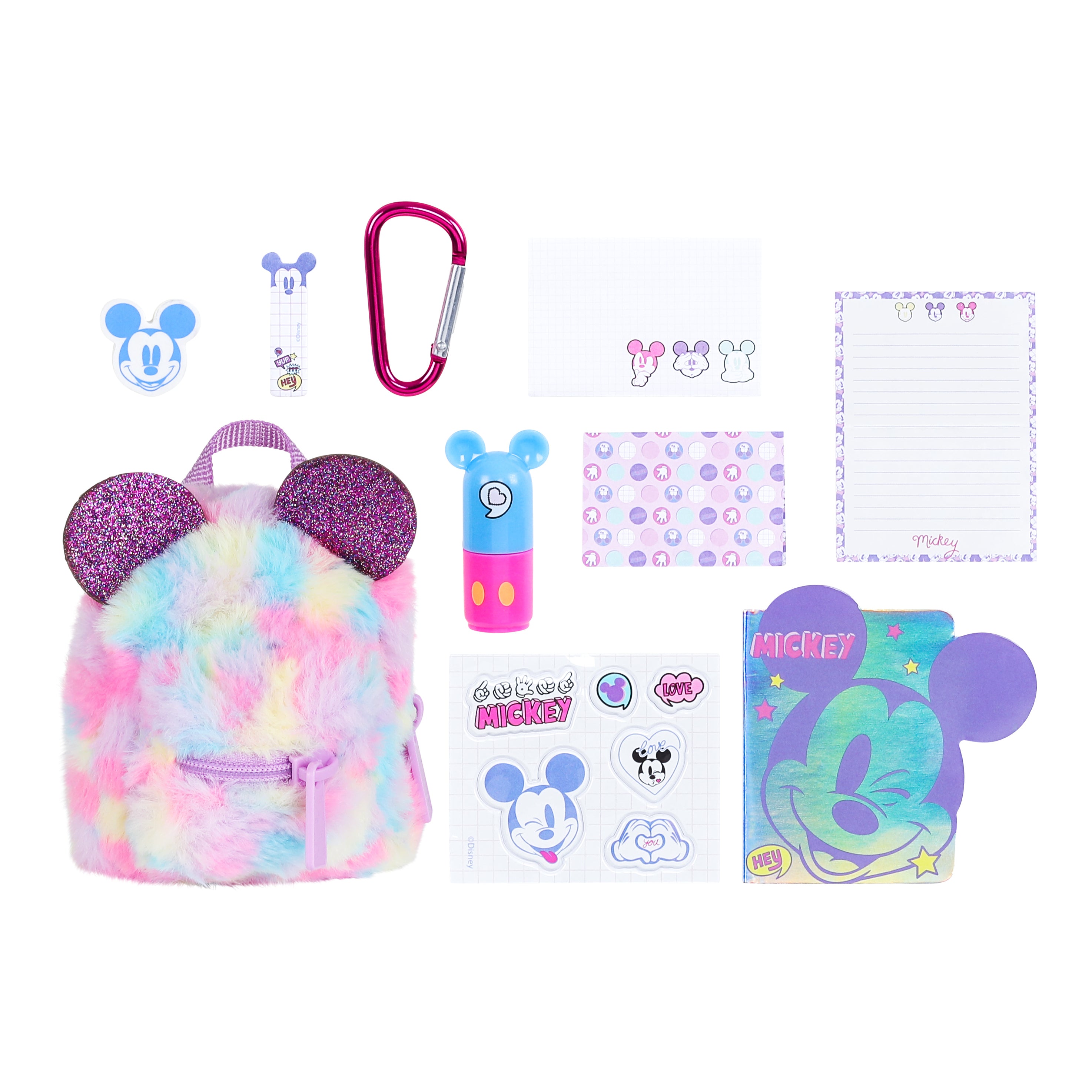 Collection of Disney-themed stationery items including a mini backpack, carabiner, and notebooks on a white background.