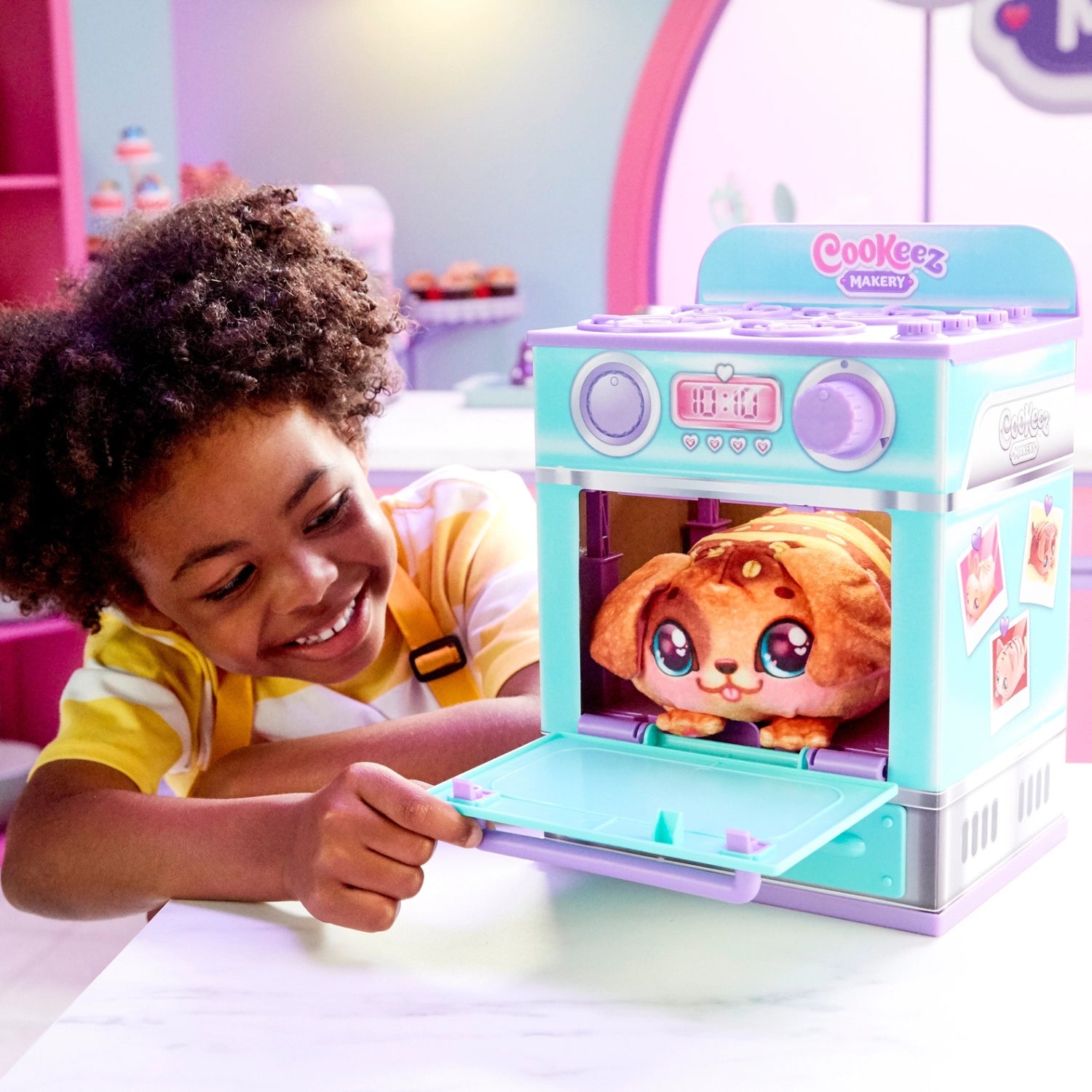 Child playing with a toy pet carrier featuring a cute animal toy inside.