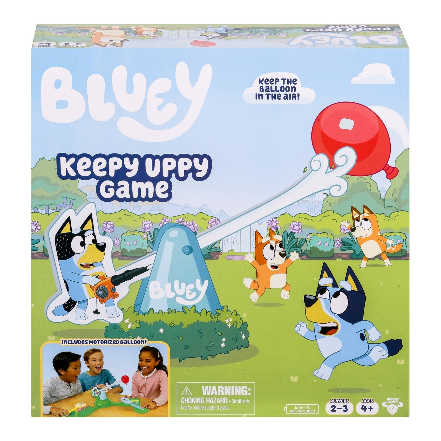 Bluey Keepy Uppy Game packaging with cartoon characters and a balloon on a blue sky background.