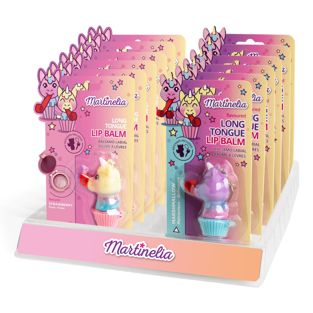 Martinelia Unicorn Tongue Lip Balm features unicorn-shaped containers and vibrant packaging in strawberry and marshmallow flavors, arranged on a white and pink stand. Ideal kids' lip balm for magical smiles!.