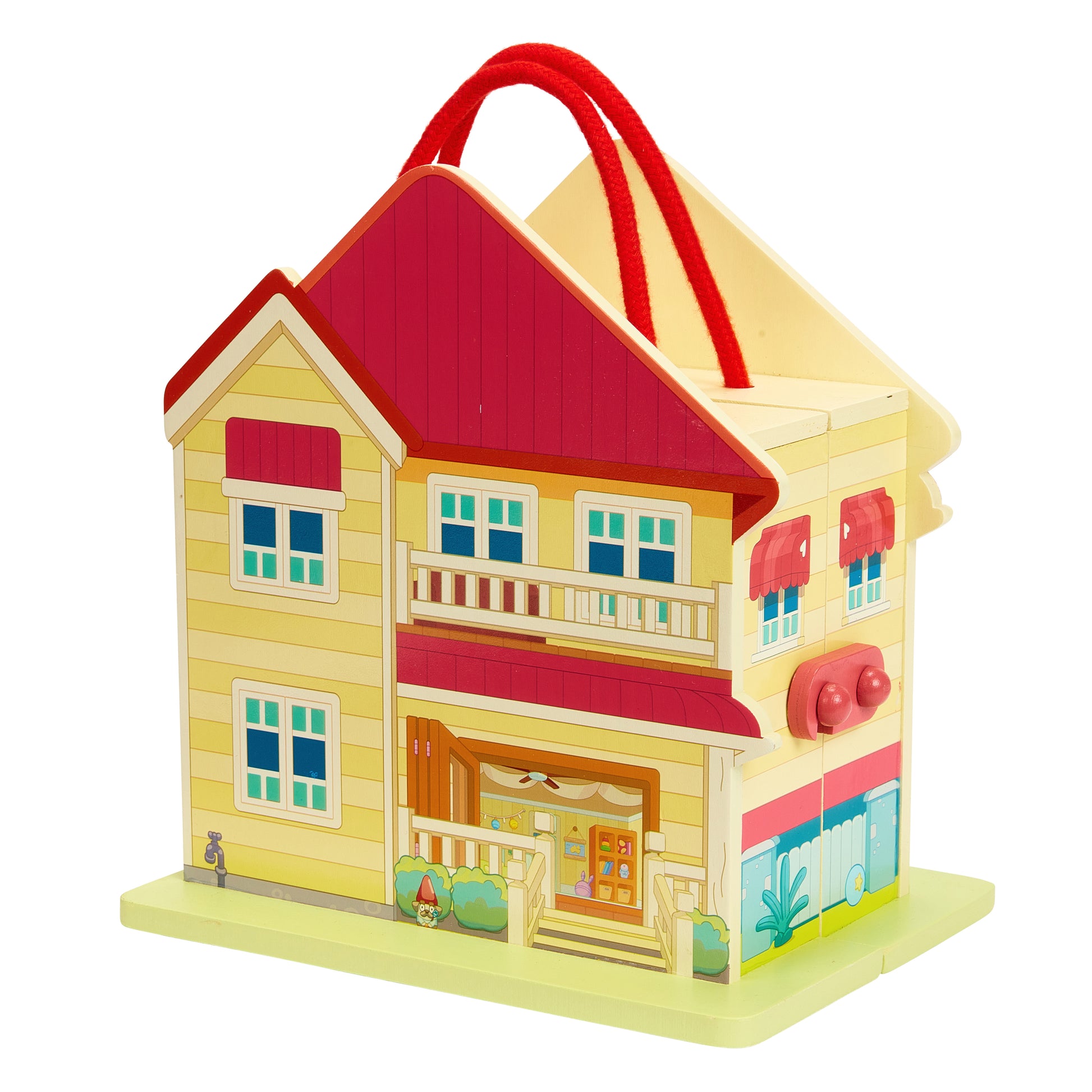 Colorful toy house with a red roof on a white background