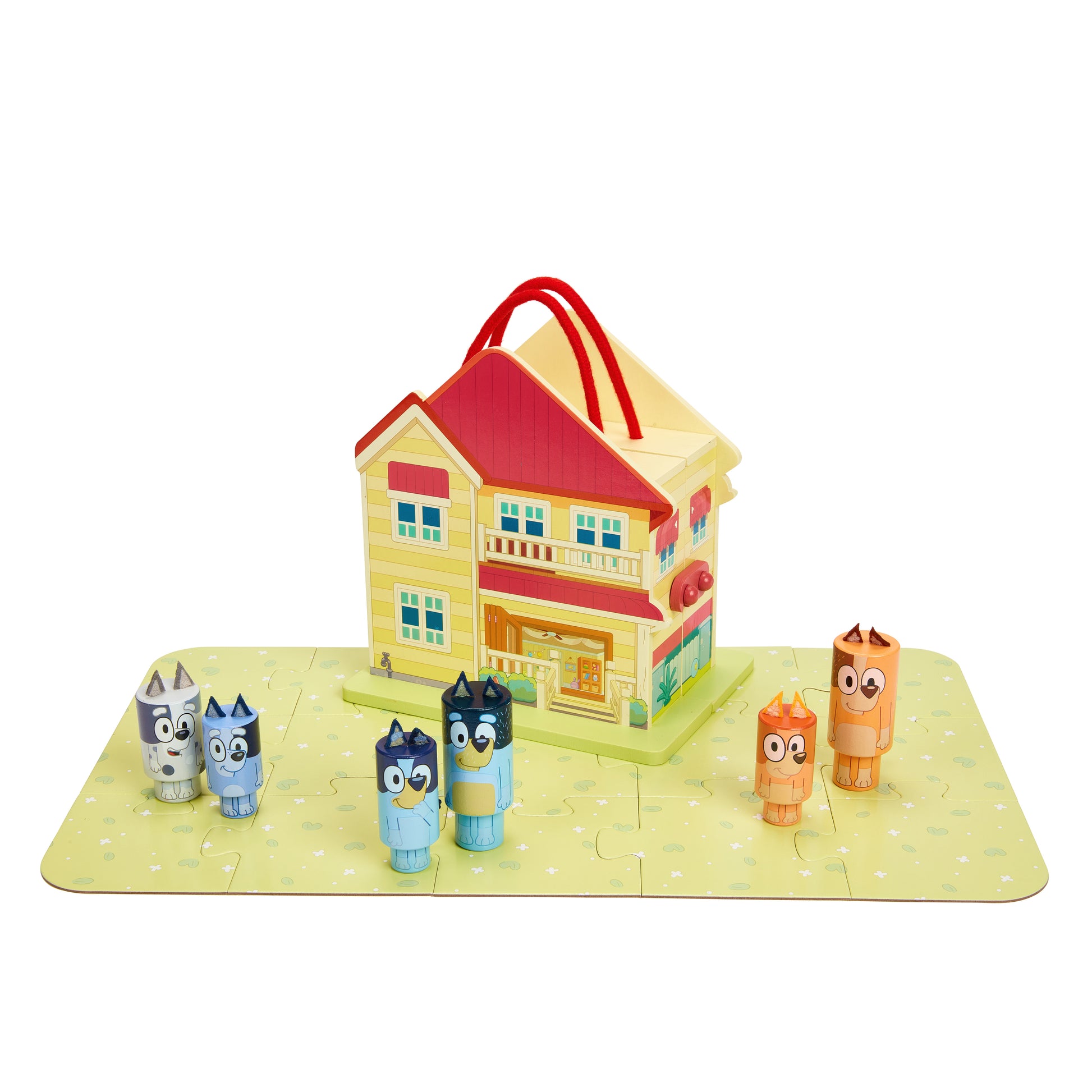 Toy house with character figures on a white background