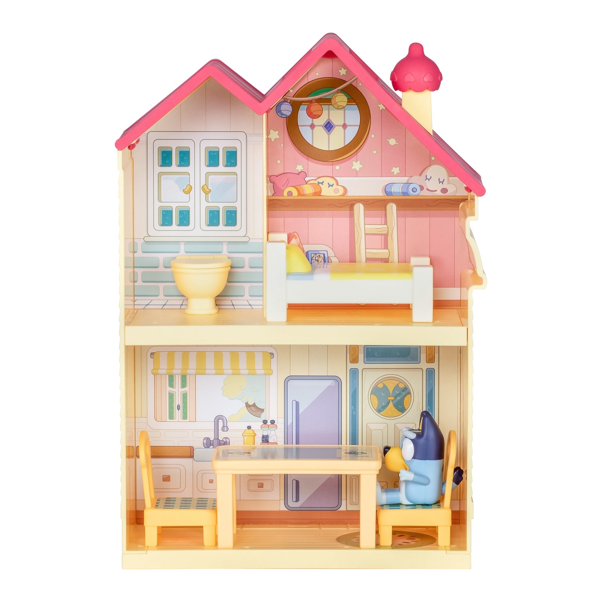 Colorful toy dollhouse with detailed interior on a white background