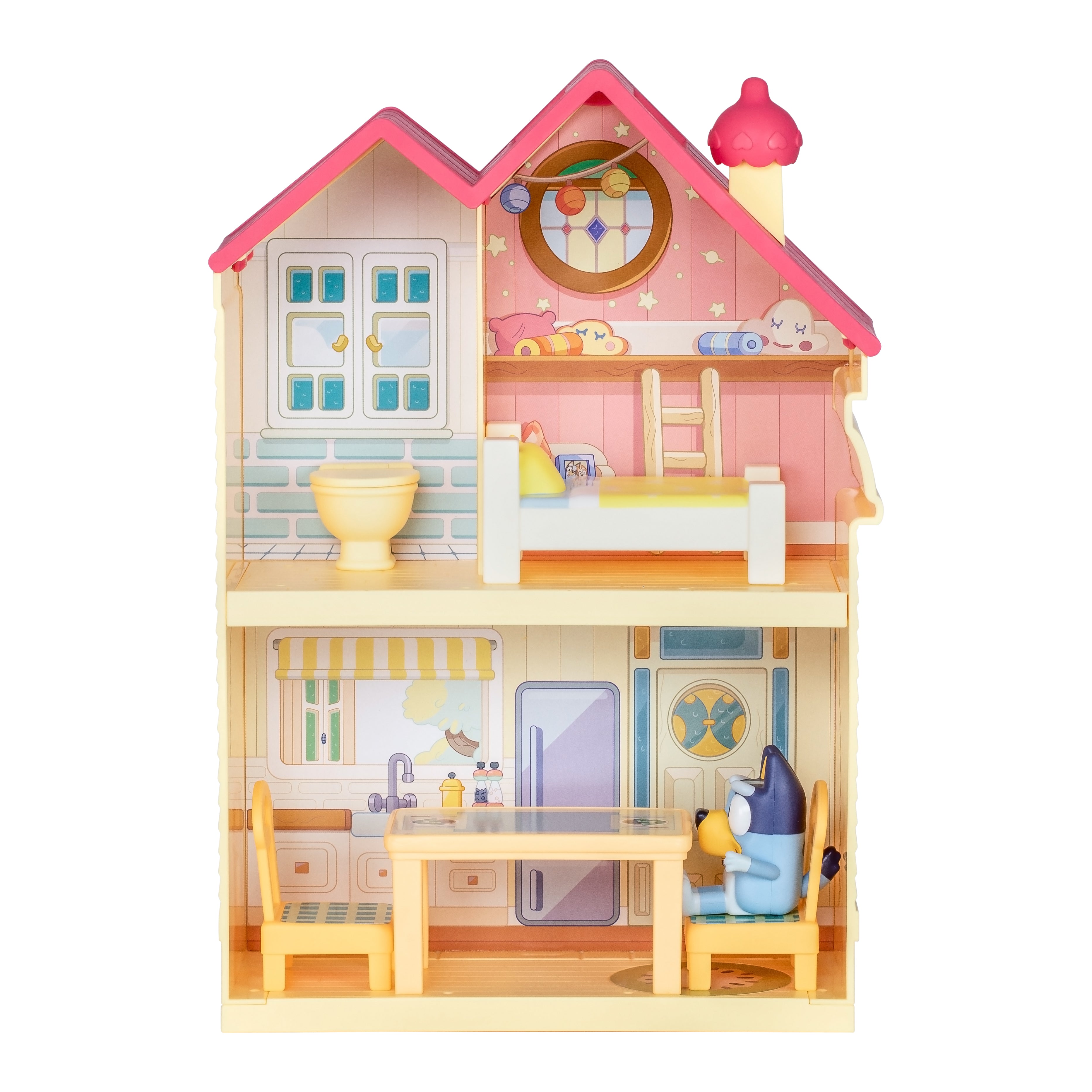 Colorful toy dollhouse with detailed interior on a white background