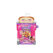 Cookeez Makery Toasty Treatz is a pink toy toaster with a smiling bread slice. Its packaging shows a girl holding a plush pet and pictures of the toaster and plush animal.