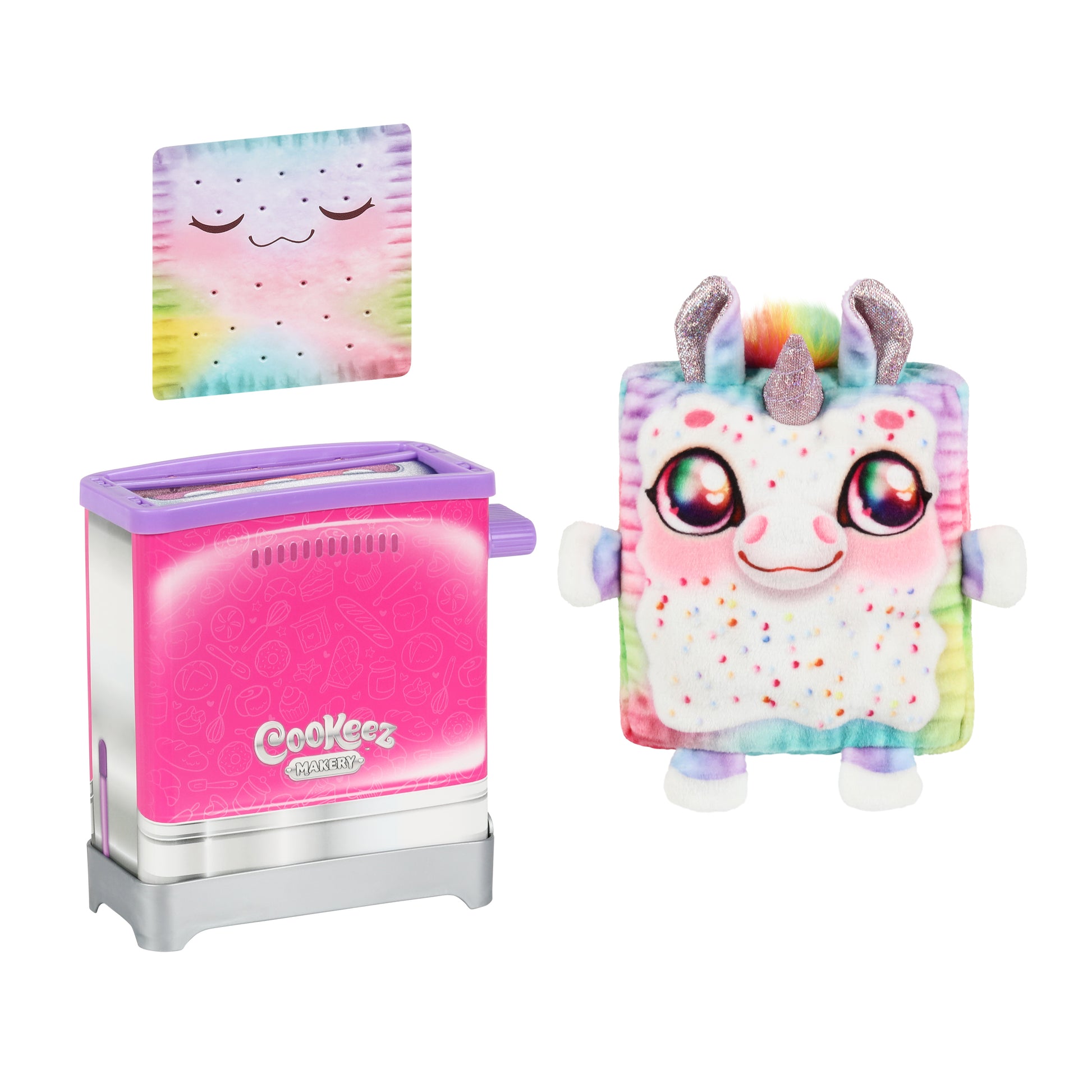 Cookeez Makery Toasty Treatz includes a plush unicorn Pop-Tart toy with colorful sprinkles, sparkly eyes, and a rainbow mane, plus a pink and silver toaster and a smiling rainbow pastry pillow.