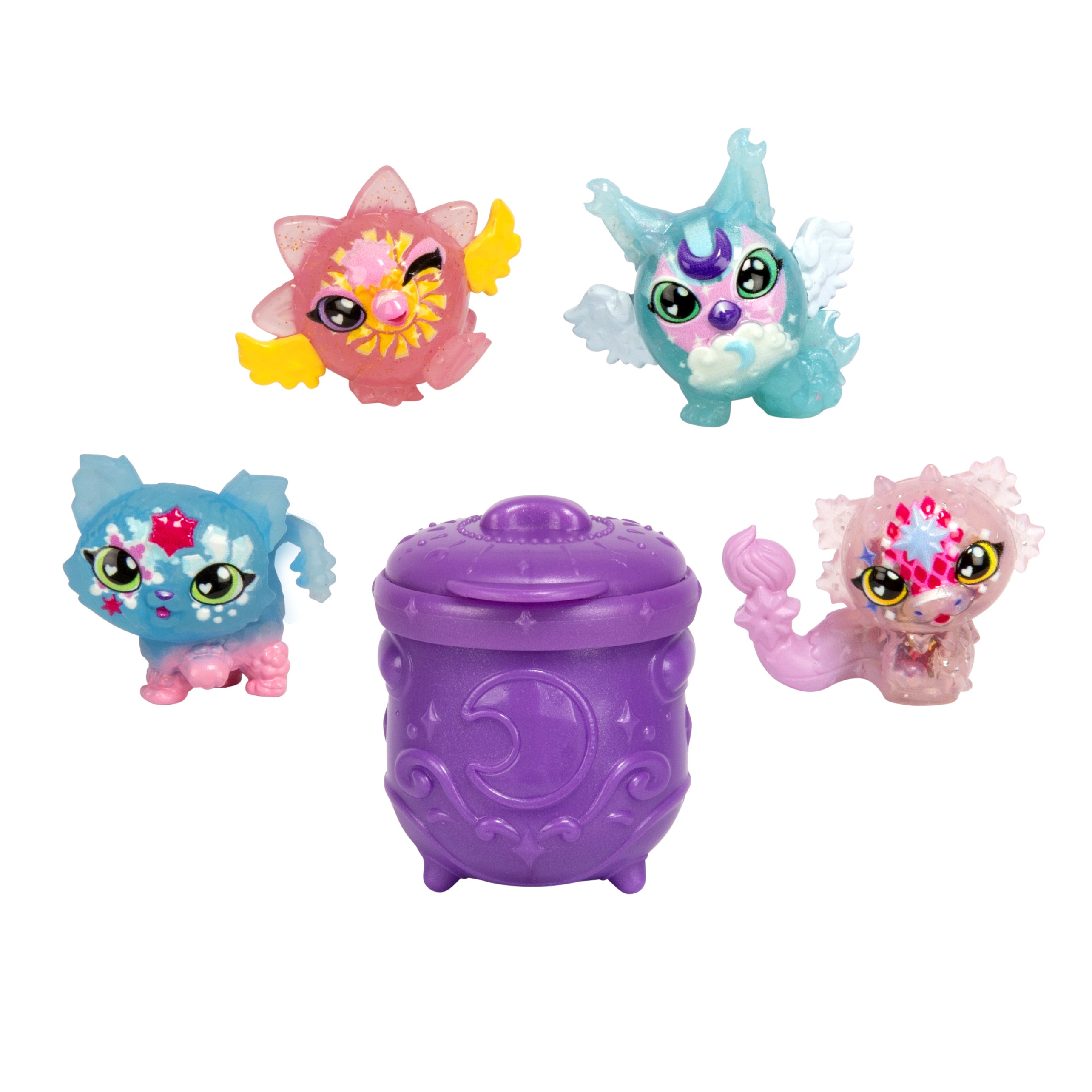 The Magic Mixies Minis 4-Pack features four colorful collectible figurines with expressive eyes and whimsical details like wings and stars, all surrounding a purple mini cauldron adorned with a crescent moon.