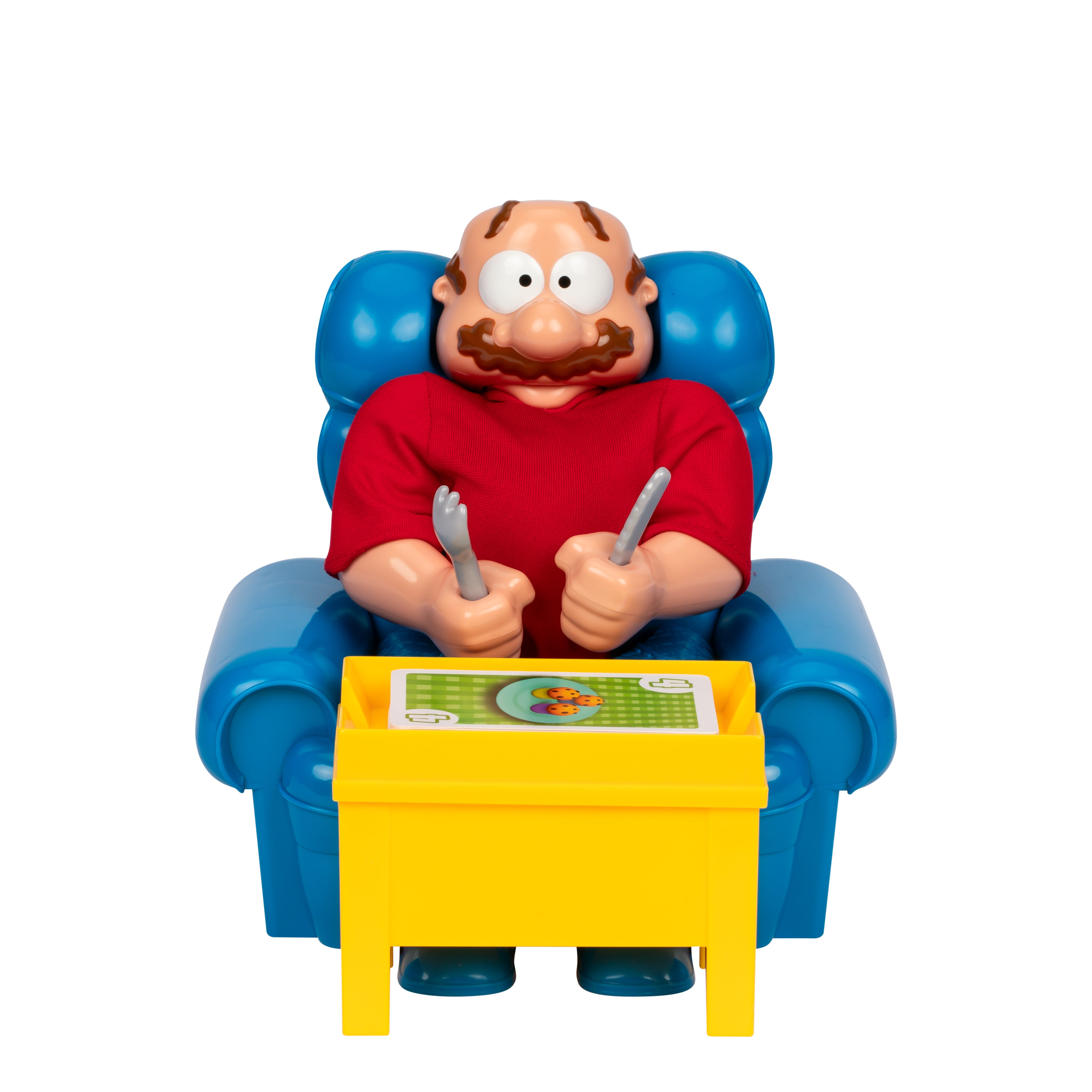 Toy figure of a man in a blue armchair with a yellow table, holding utensils.