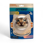 Astroverse Catstronaut is a grip strength toy with a squishy cat face inside an illustrated astronaut helmet, vibrant space-themed graphics, and warning labels on its cardboard backing.