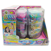 The Jelly Cakes S1 Chillin Cake CDU by Sky Castle Toys features colorful packaging with a girl playing and highlights a collectible ring inside, 3 layers to mix, and 24 surprises to collect.
