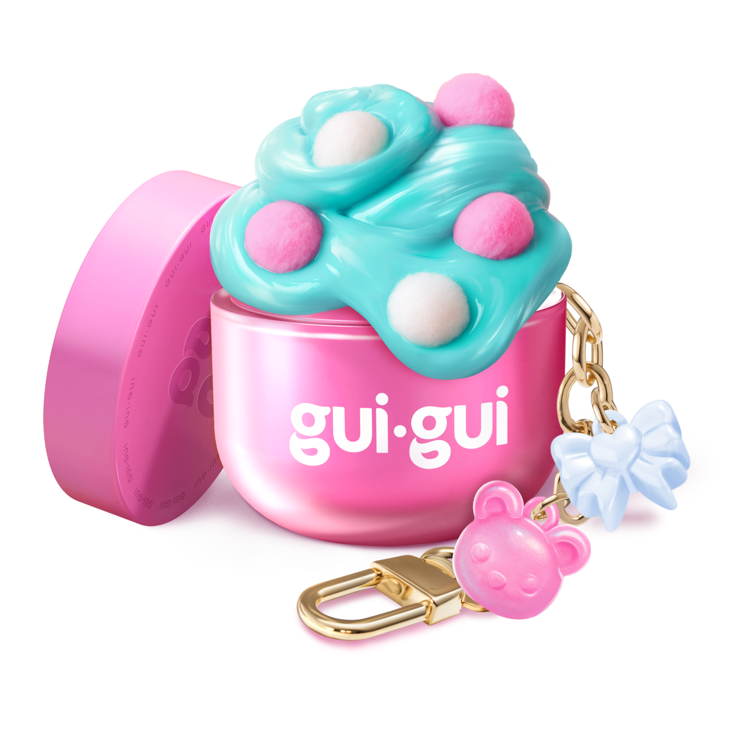 The Gui Gui Mini Backpack Charm Slime by Moose Toys is a small pink container with blue and pink fluffy slime, white and pink dots, plus a gold keychain featuring a pink bear charm and a blue bow charm.