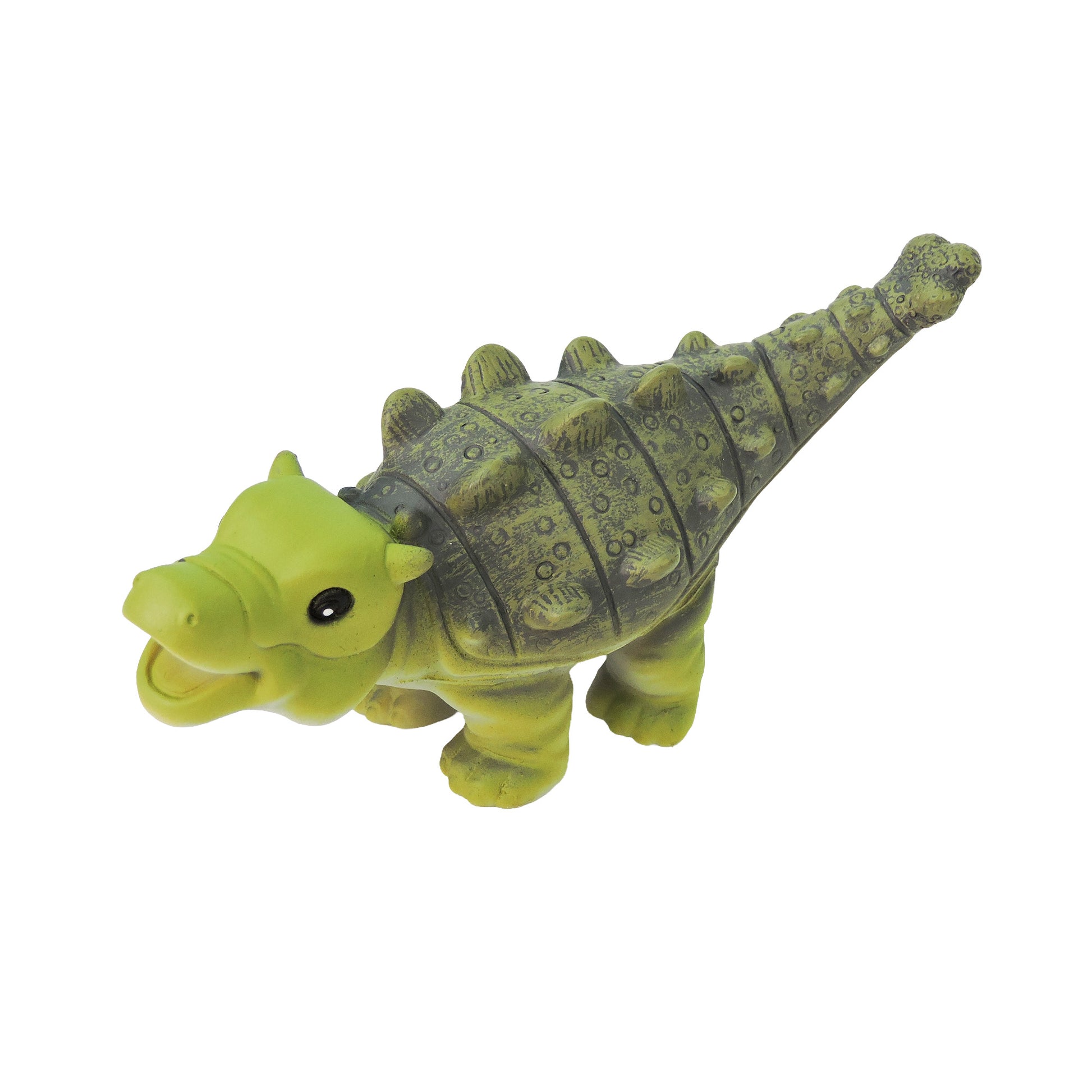 The Toysmith Baby Dino Figure by Toysmith is a green and gray ankylosaurus-style toy with a smiling face, four legs, a spiked back, and a clubbed tail, shown against a white background.