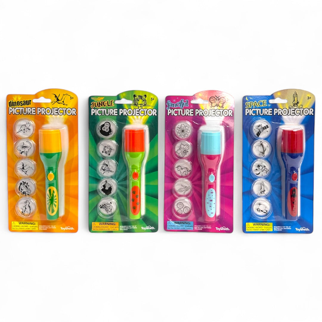 Four Toysmith Mini LED Flashlight Projectors by Toysmith are shown side by side, each themed as dinosaur, jungle, unicorn, or space. Each handheld pack contains three image disks featuring matching illustrations.