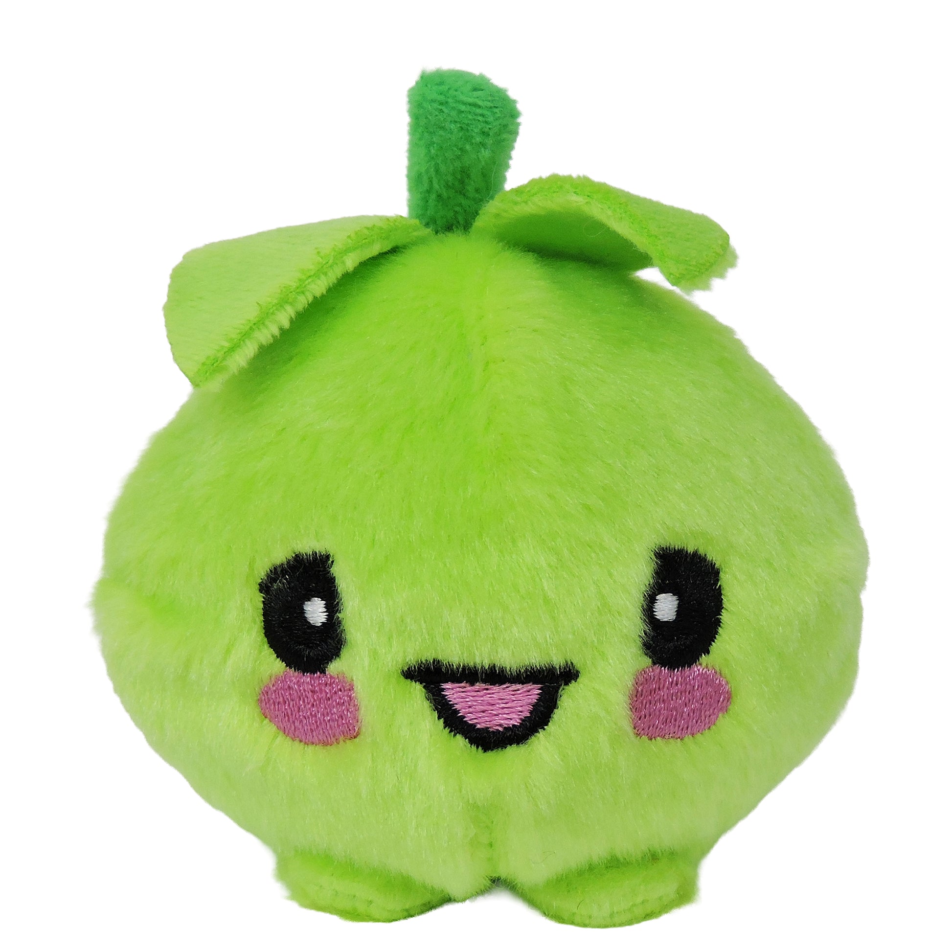Sugar Skwisheez Night Shades is a round, slow-rising plush toy shaped like a bright green fruit with leaf accents, embroidered eyes, a smiling mouth, and pink cheeks. Pre-order this cute Sugar Skwisheez plush today!.